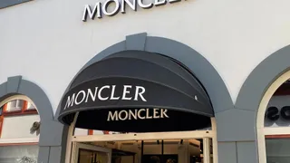 Moncler supera le attese nel terzo trimestre, ma rallentano il marchio principale e il canale diretto